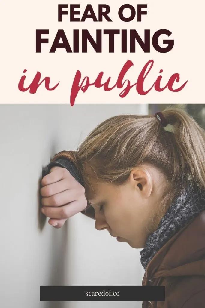 Girl leaning on hand against the wall. 